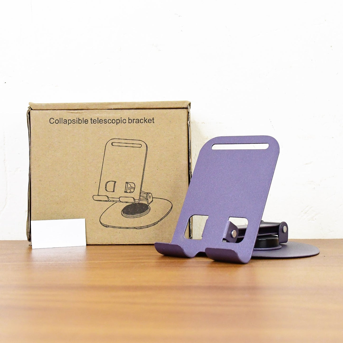 Live view of a smartphone held securely by the foldable mobile stand.