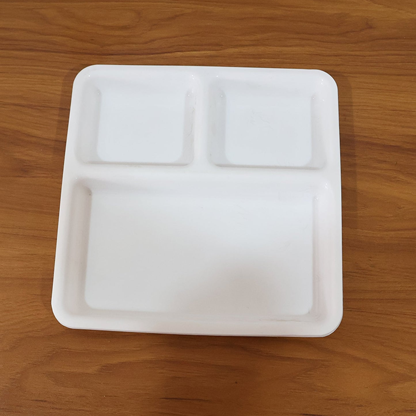 Plastic plate with three divided sections for meal portion control