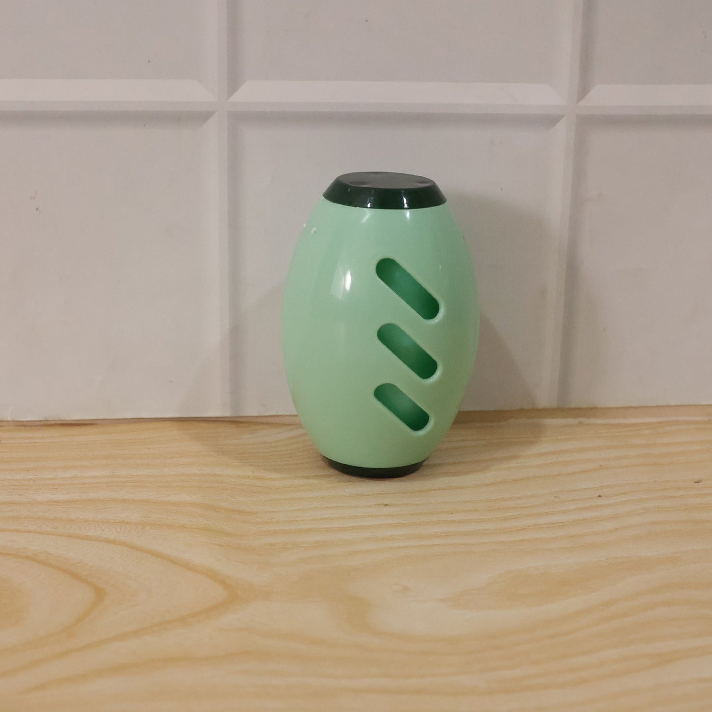 Hand demonstrating reusable lint roller on surface