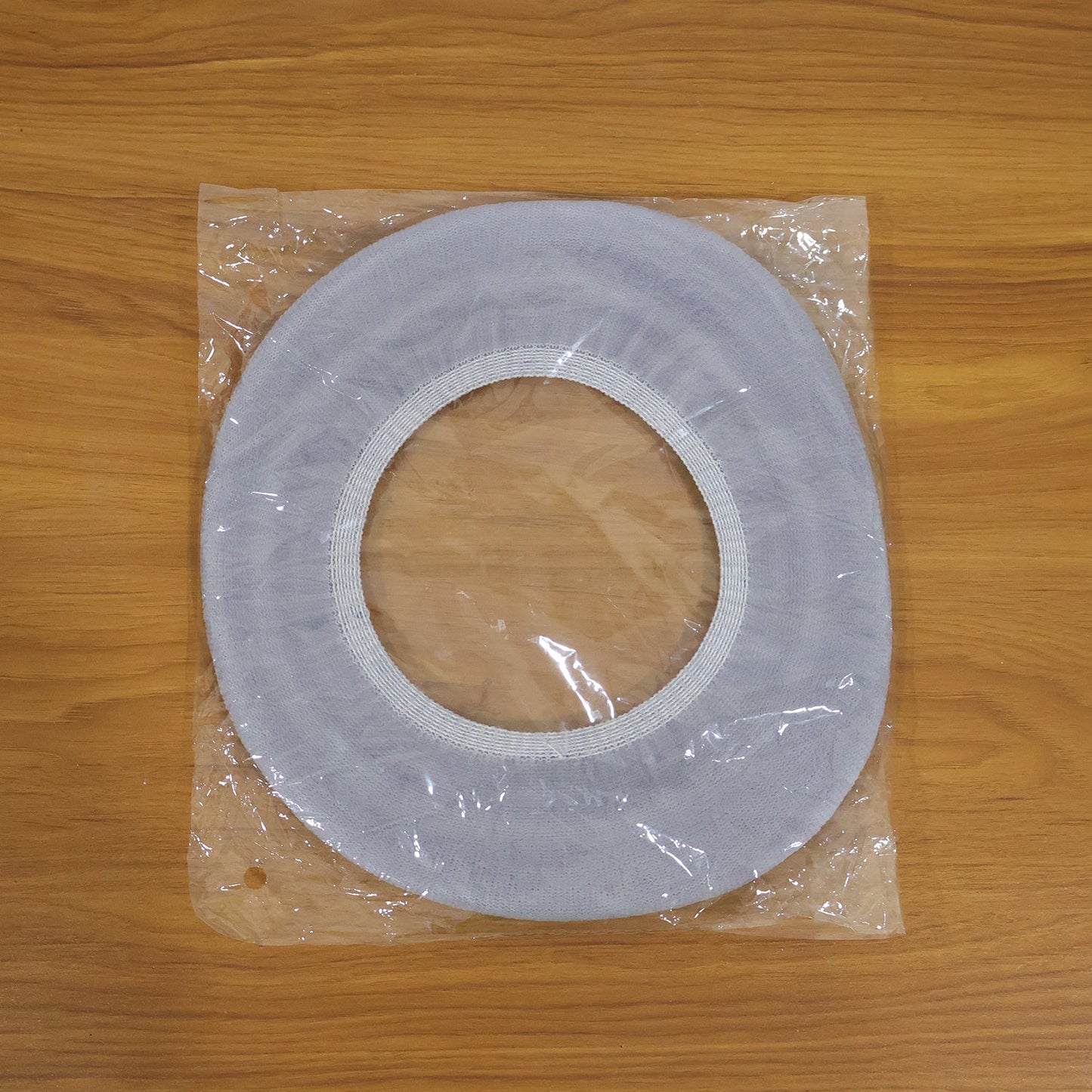 Bathroom setting with soft fabric toilet seat cover