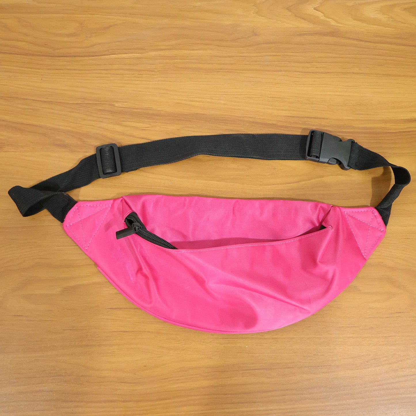 Model demonstrating crossbody waist bag for active use