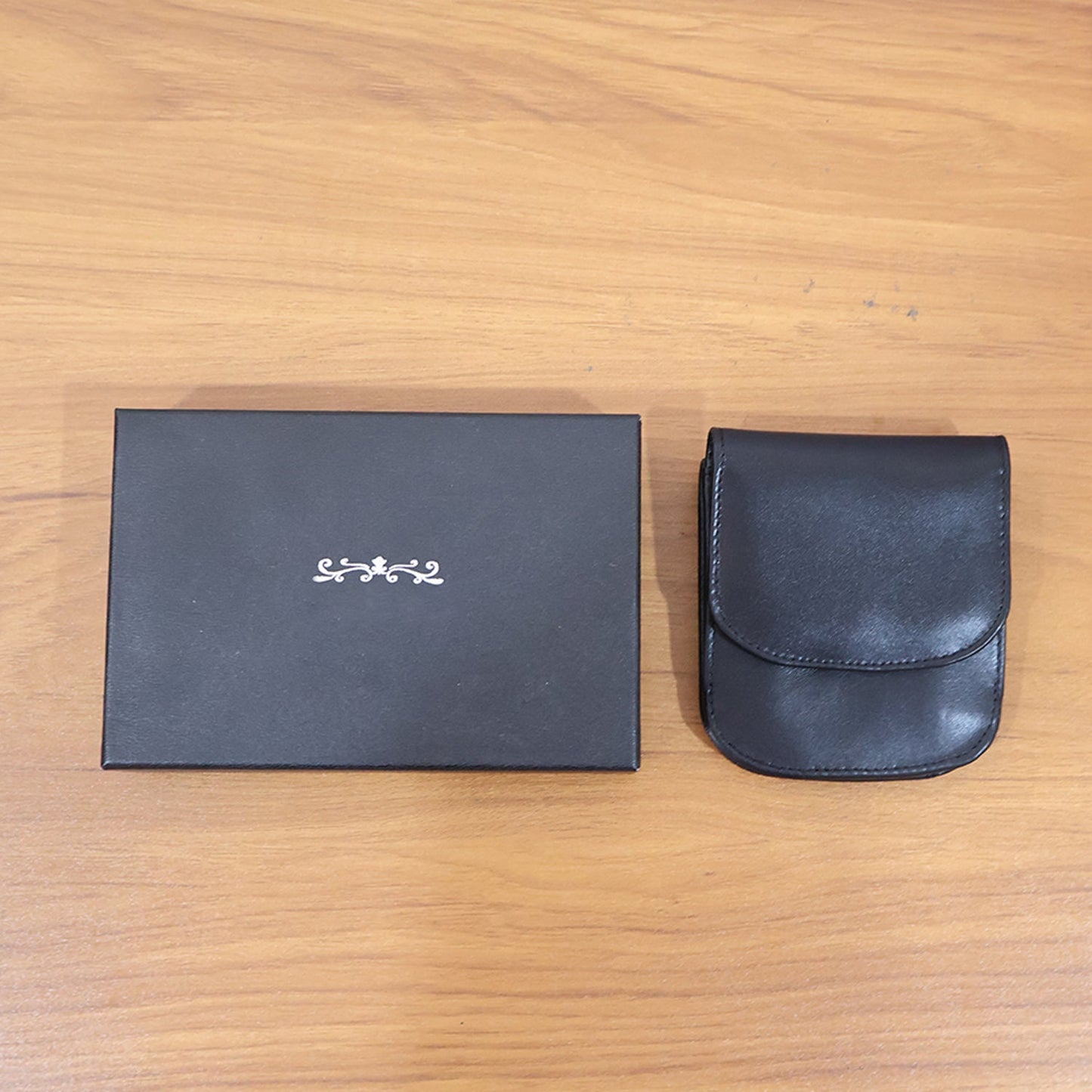 Portable wallet pouch for secure storage of cash and small essentials