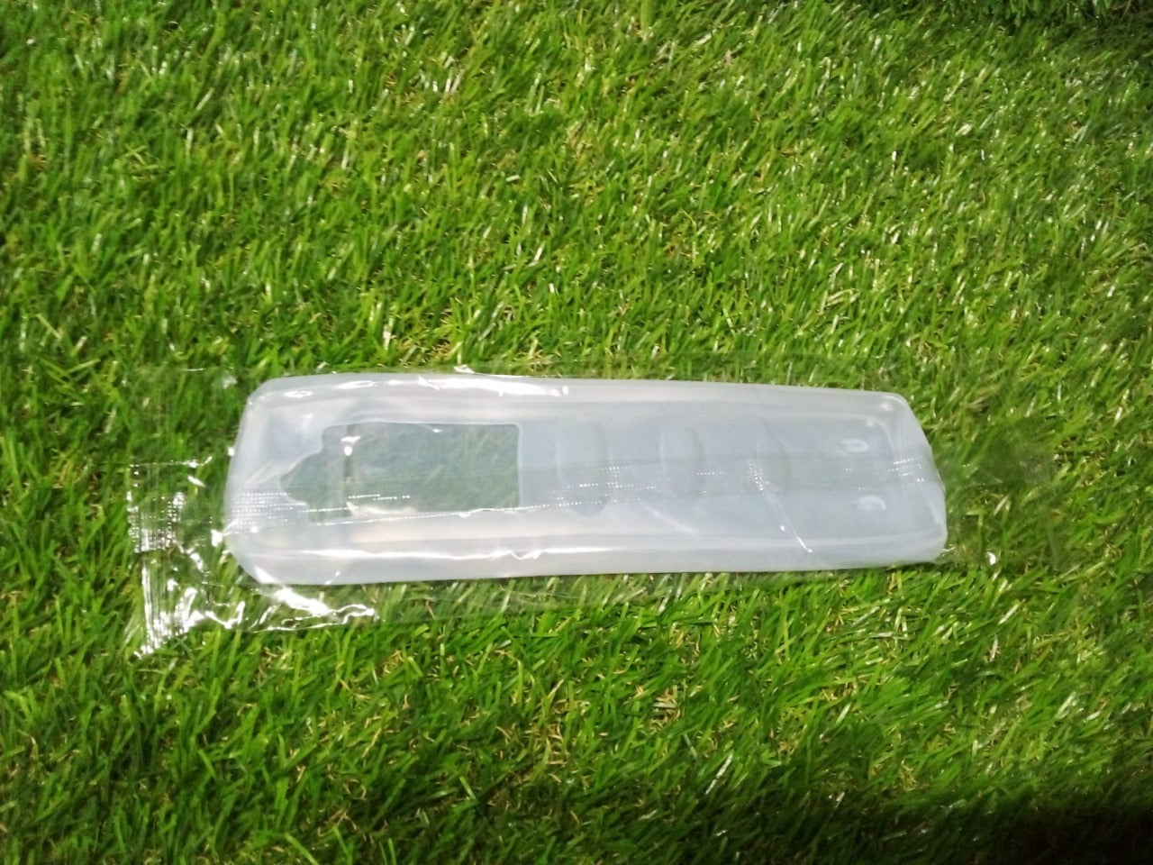 Full view of the clear remote pouch cover, highlighting its protective finish.