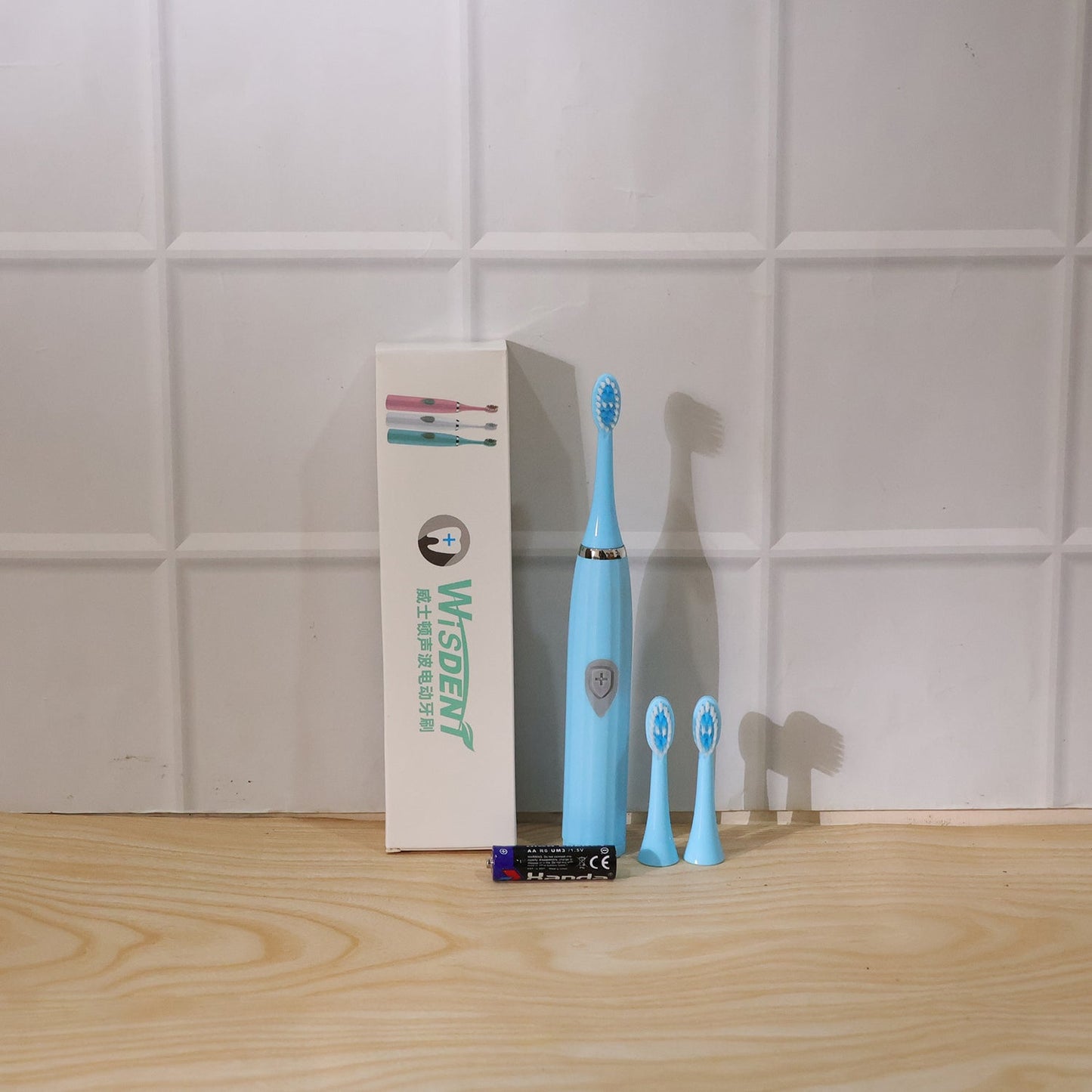 The battery operated electric toothbrush shown in a modern bathroom setting, ready for use.
