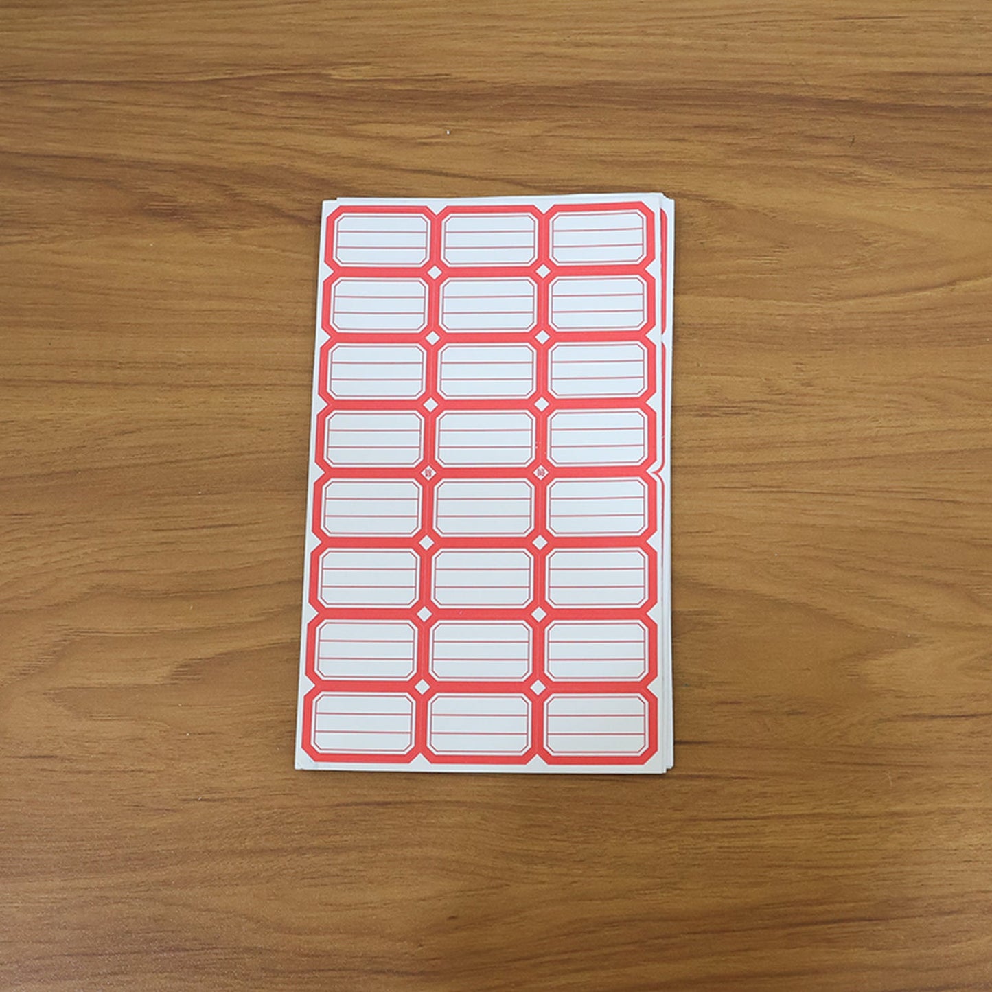 Close-up showing multiple sheets of blank writable self-adhesive shipping label stickers