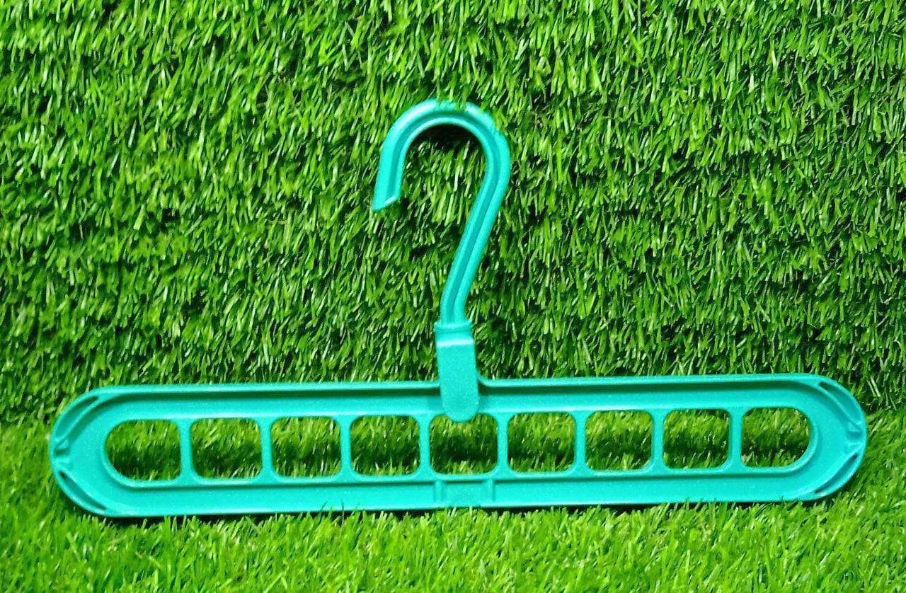 Single multi-functional clothes hanger demonstrating its vertical hanging option.