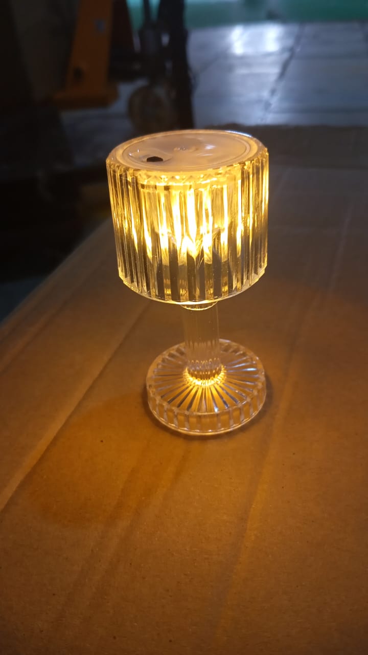 Mini Acrylic LED Desk Lamp creating a cozy ambiance in a modern interior.
