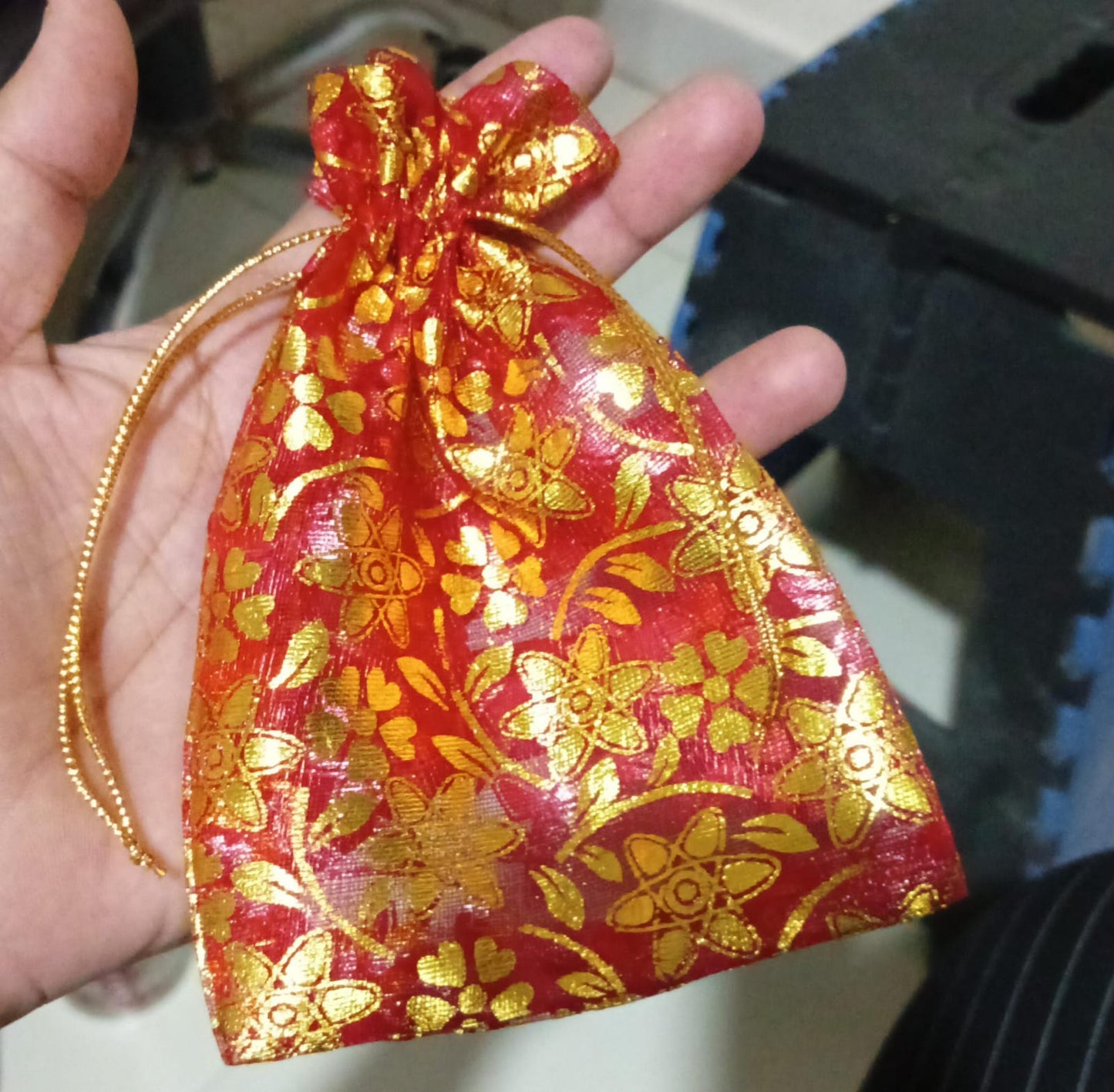 Group of net fabric gift pouches, highlighting their versatility for various items.