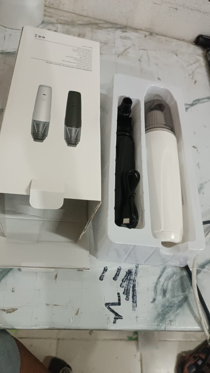 Portable cordless handheld vacuum cleaner, lightweight and travel-friendly for on-the-go cleaning