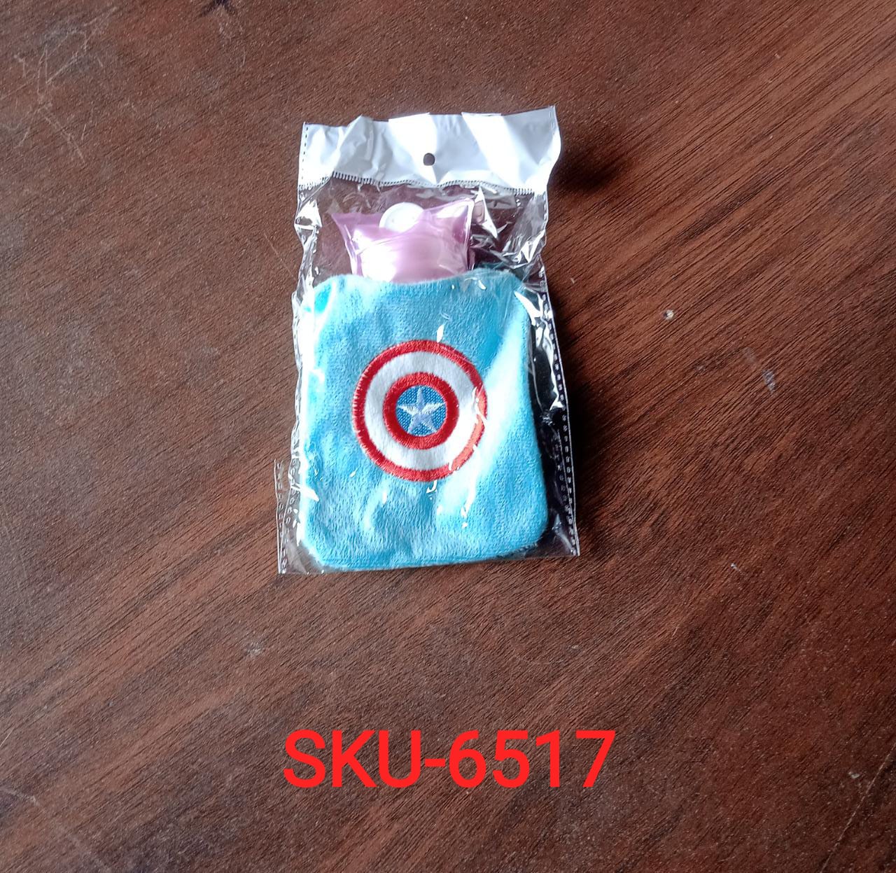 Captain America hot water bag providing warmth for hands and feet.