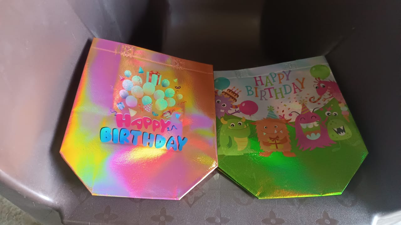 Close-up of fabric texture of reusable birthday gift bag made of non-woven material