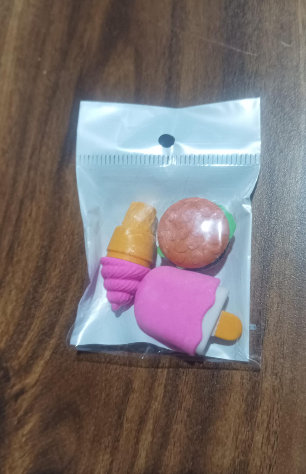 Variety of fancy erasers displayed together, showcasing their diverse designs.