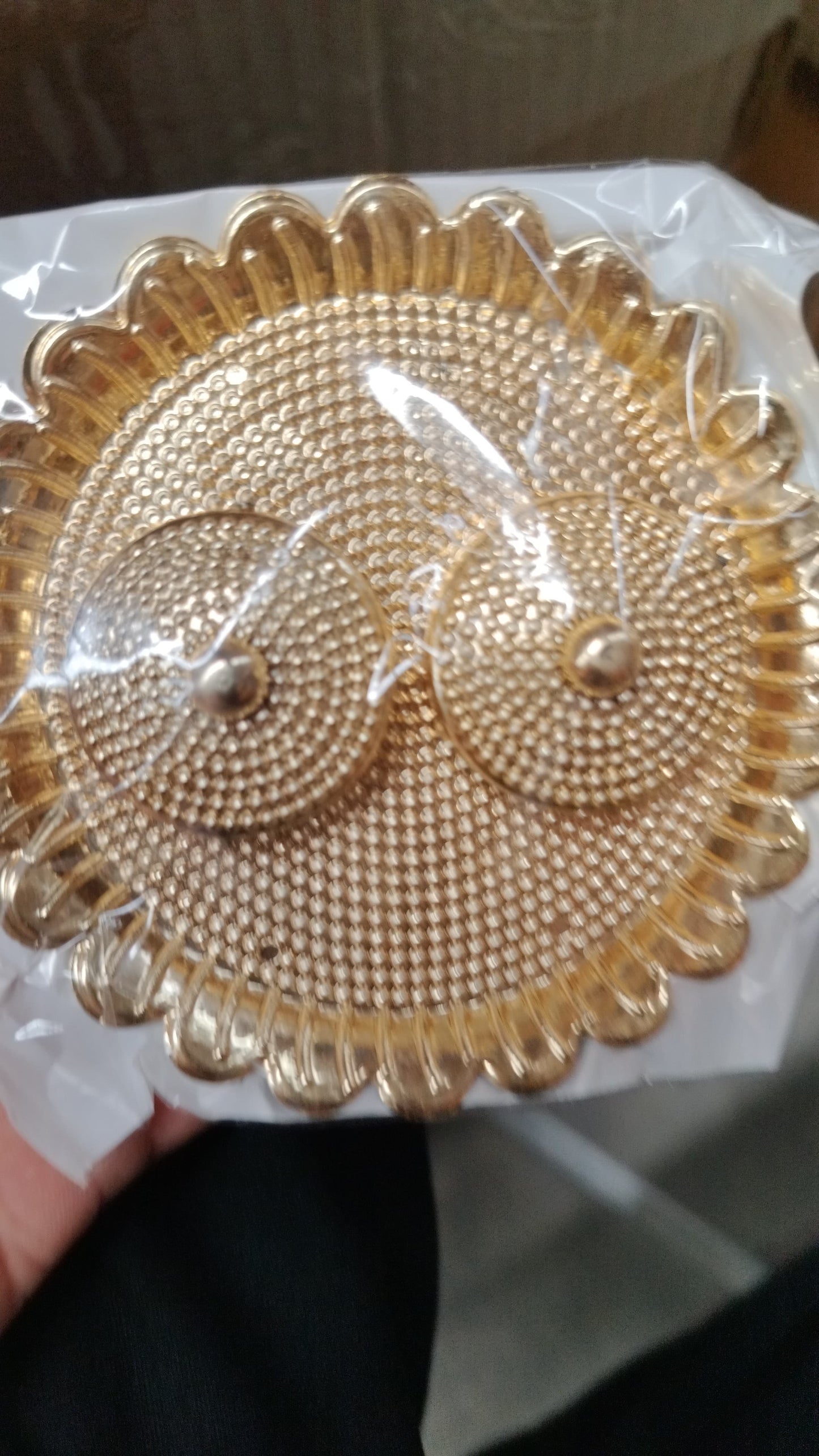 Traditional round Puja Thali presented as a thoughtful gift for special occasions.
