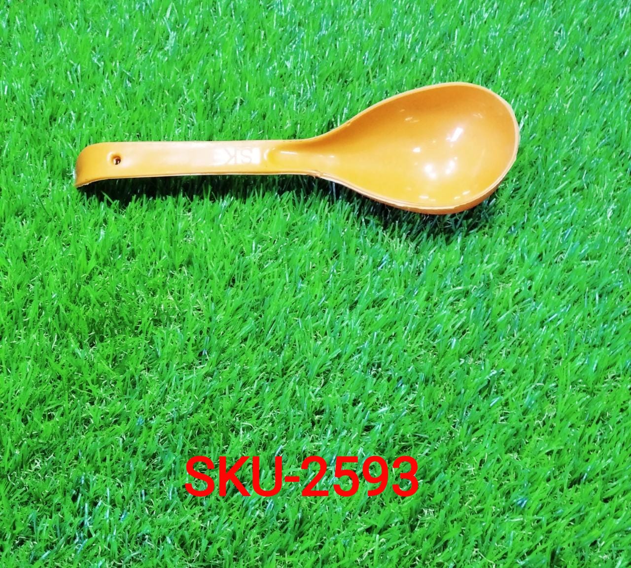 Simple yet elegant plastic serving spoon, showcasing its practical shape for serving various dishes.