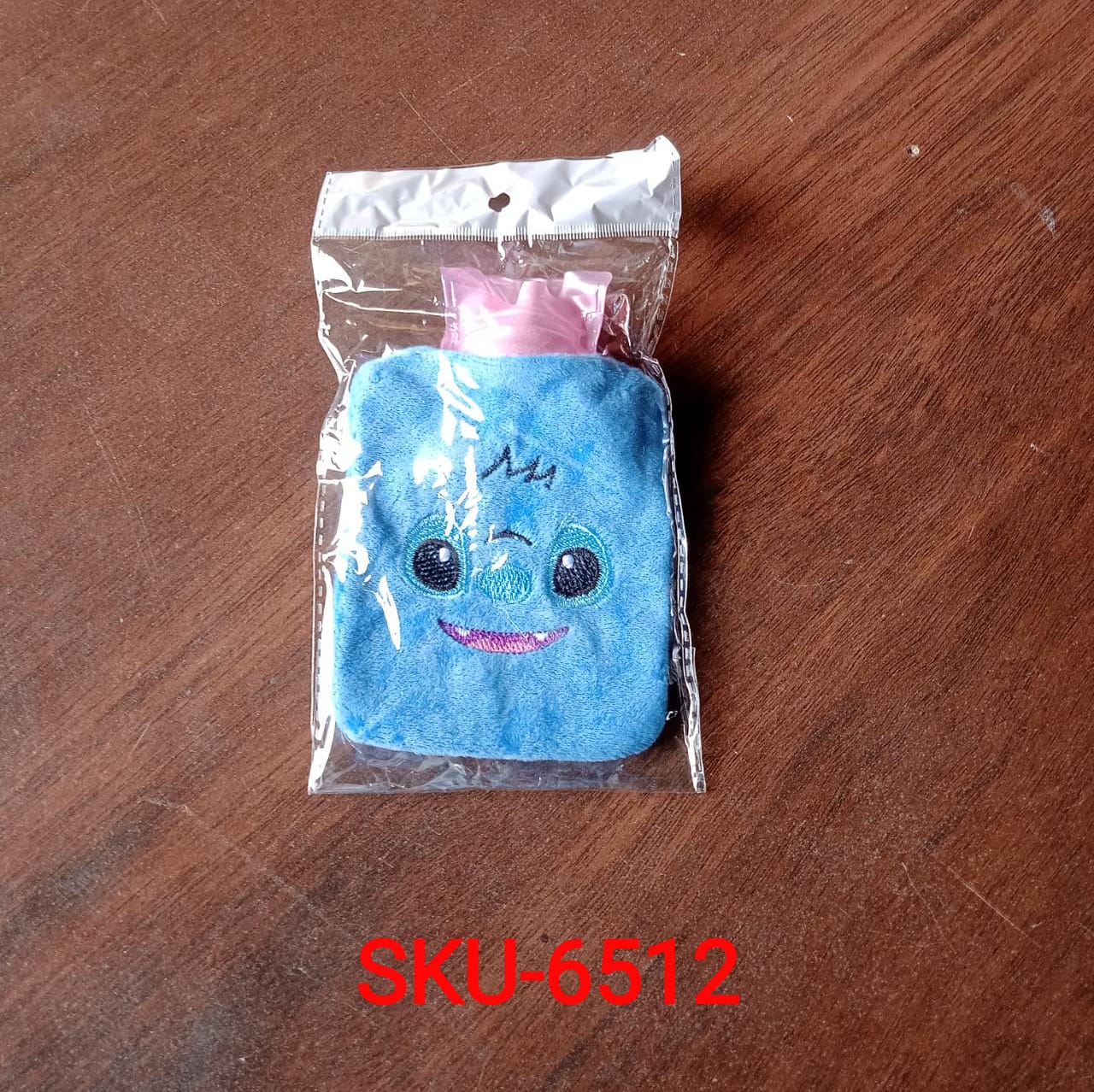 Detailed image showing the small hot water bag's leak-proof cap and durable material.