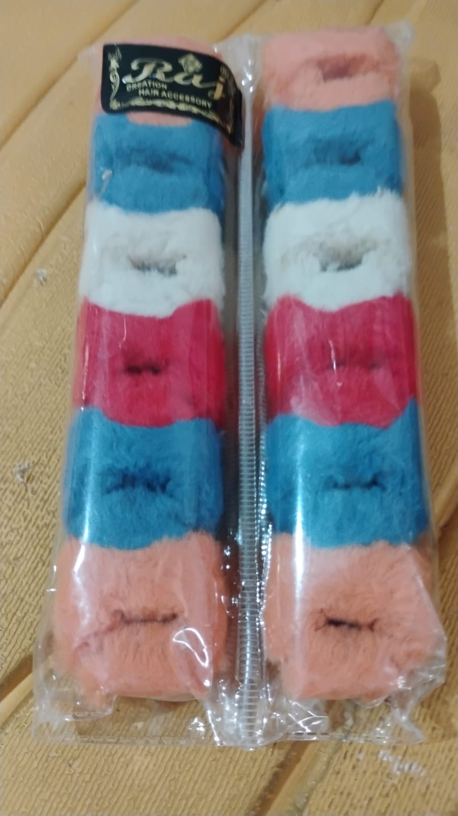 Close-up of small hair claw clip in plush texture for firm hold