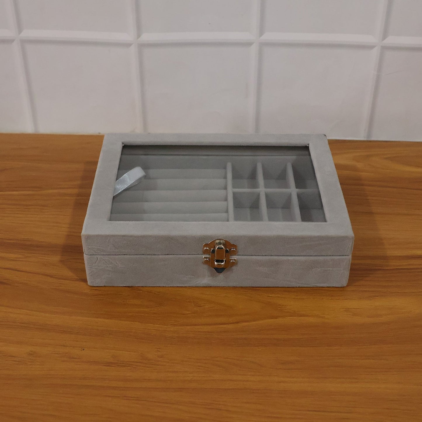 Back view of velvet jewelry organizer with transparent lid