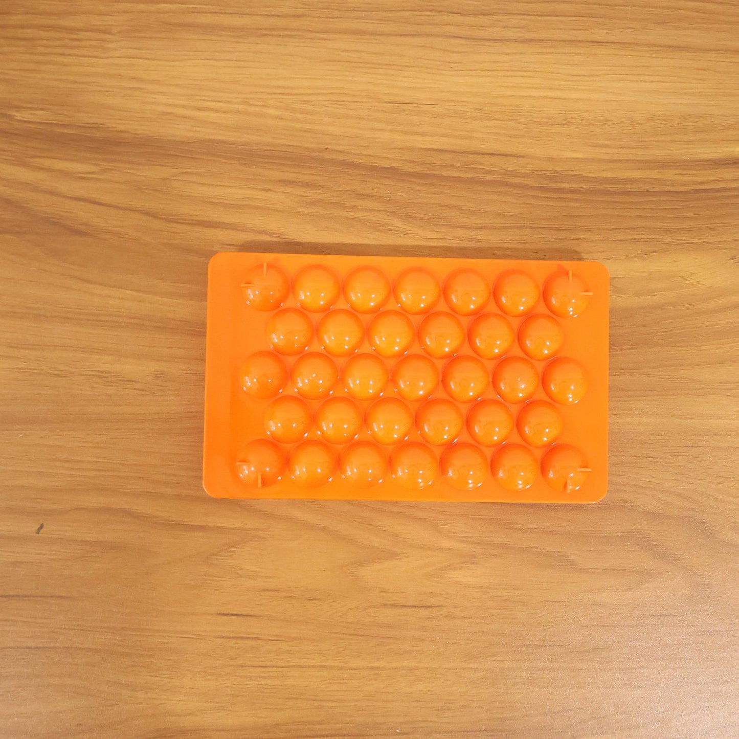 Kitchen candy making mold in orange