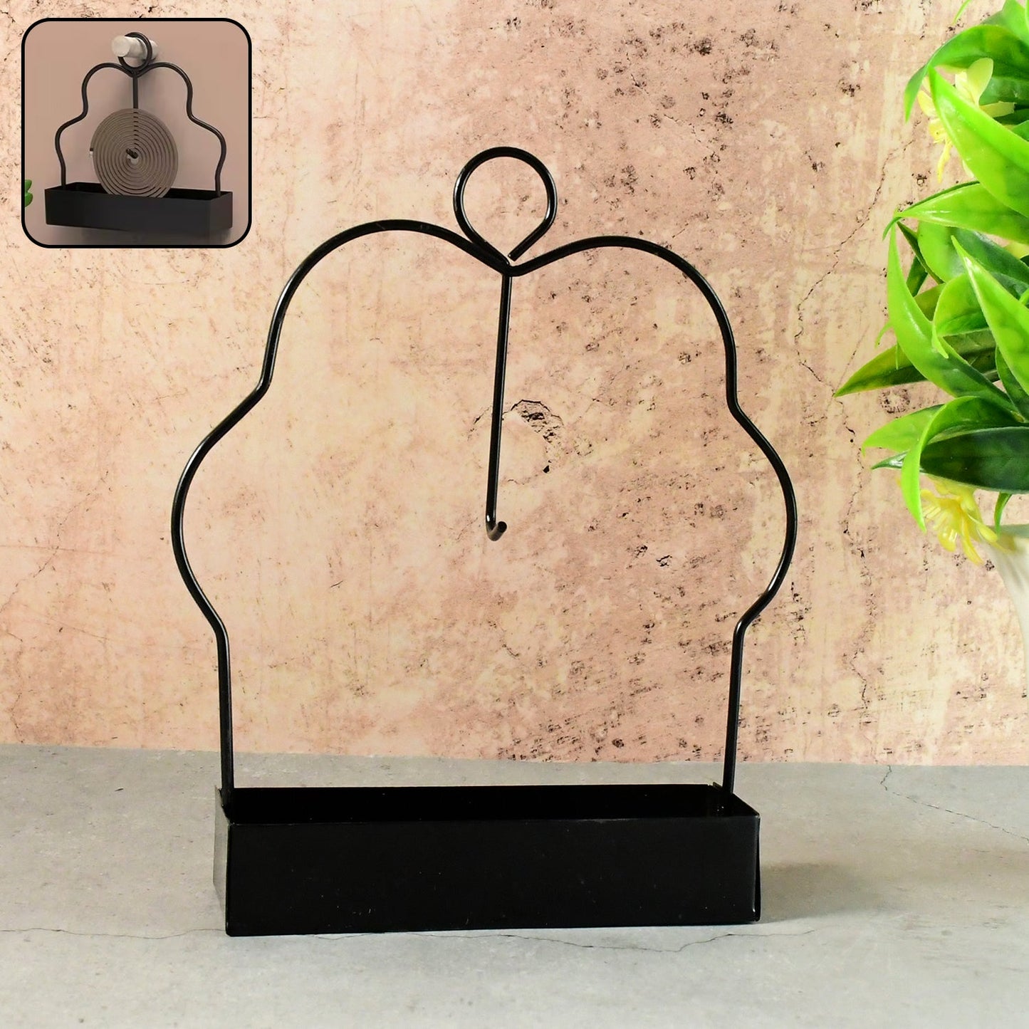 Mosquito coil holder ready for use on balcony or garden seating area