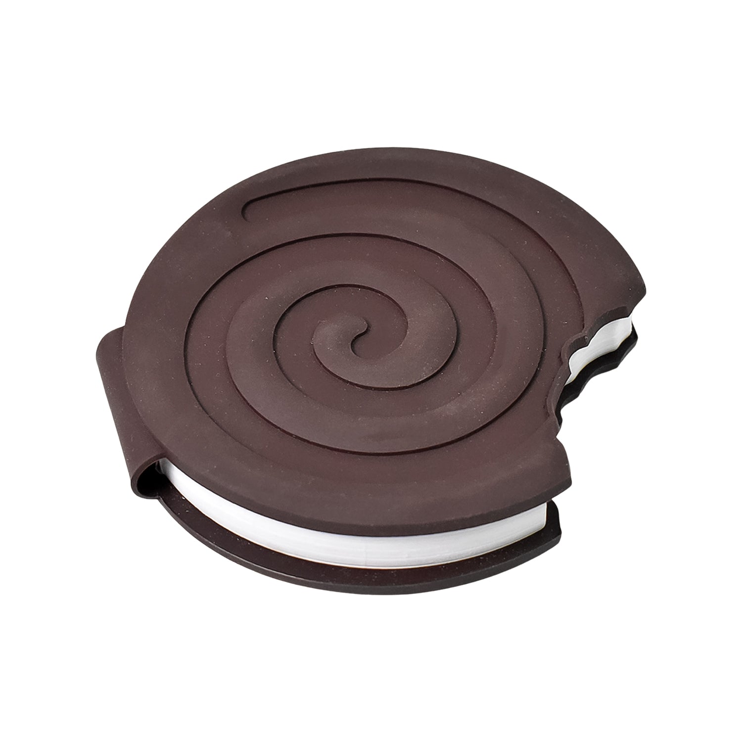 Hand holding the compact round Chocolate Diary, highlighting its portable size.