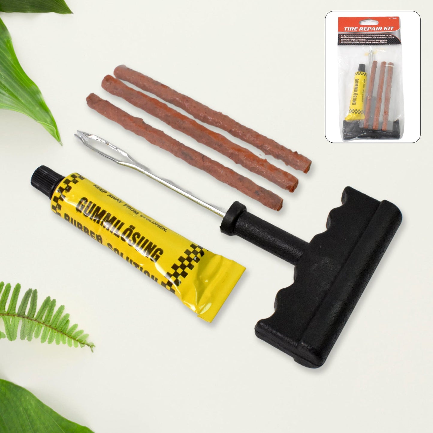 Components of the tubeless tyre repair kit including the reamer and insertion tool.