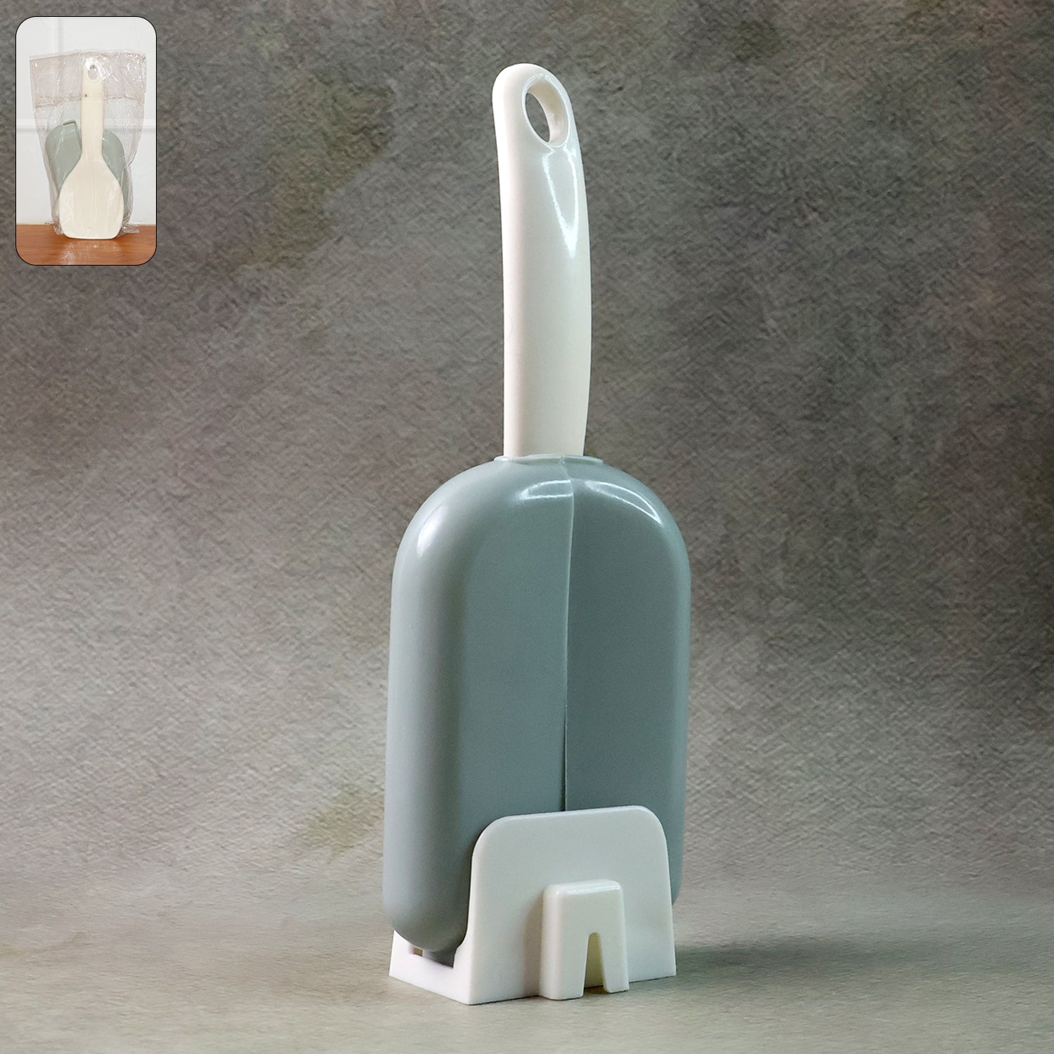 Automatic rice spoon holder with hygienic dust cover on kitchen counter
