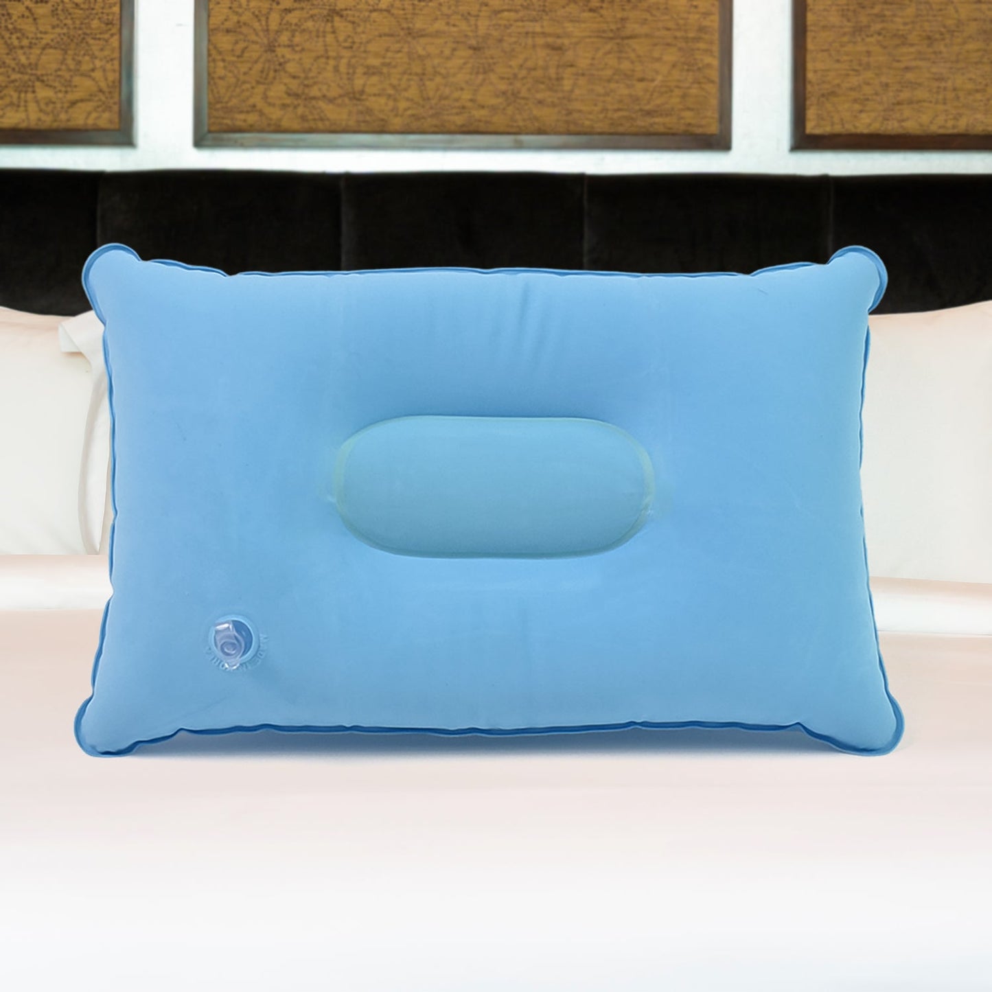 Inflatable travel pillow showing its compact size and comfortable design