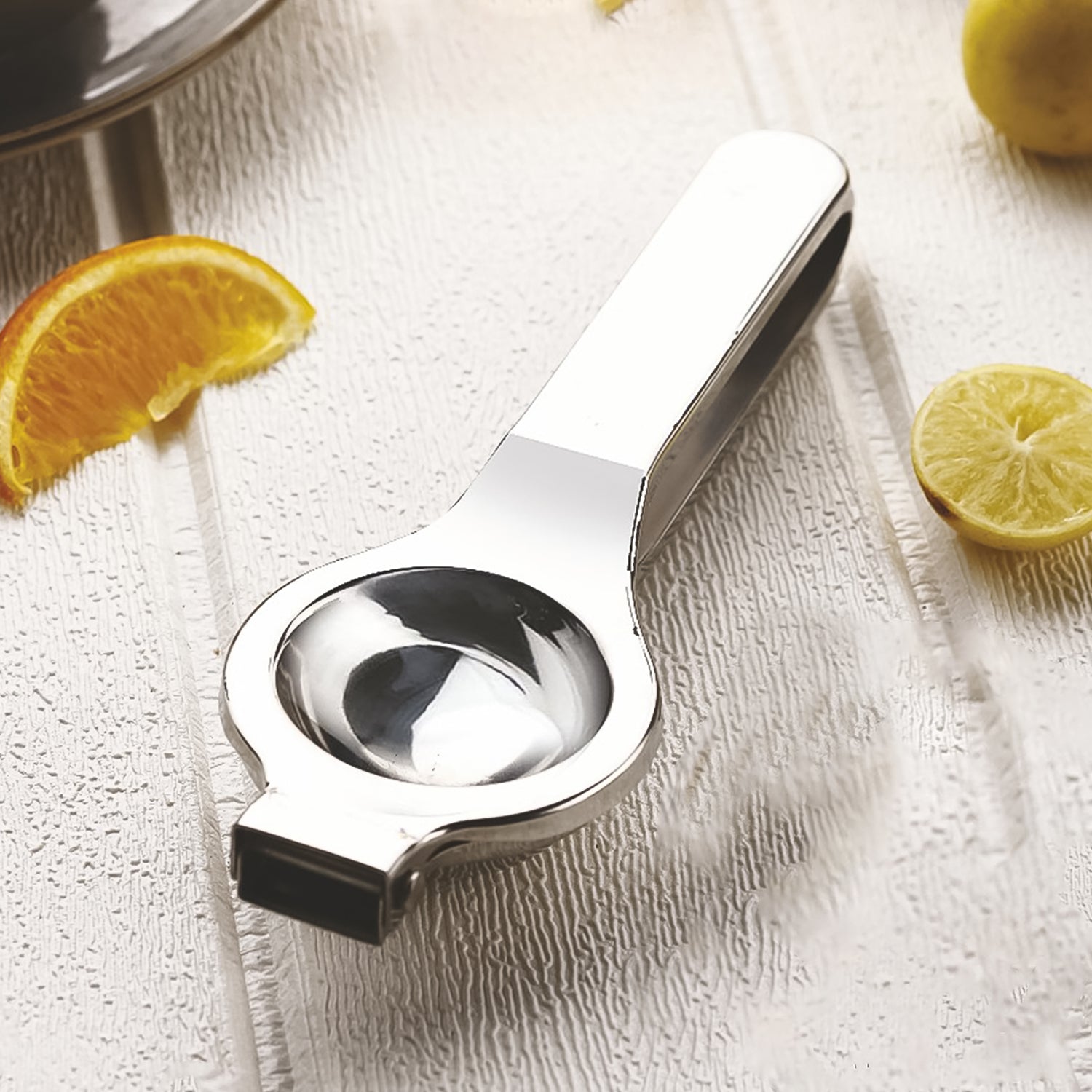 Stainless steel lemon press with ergonomic handle for easy juice extraction