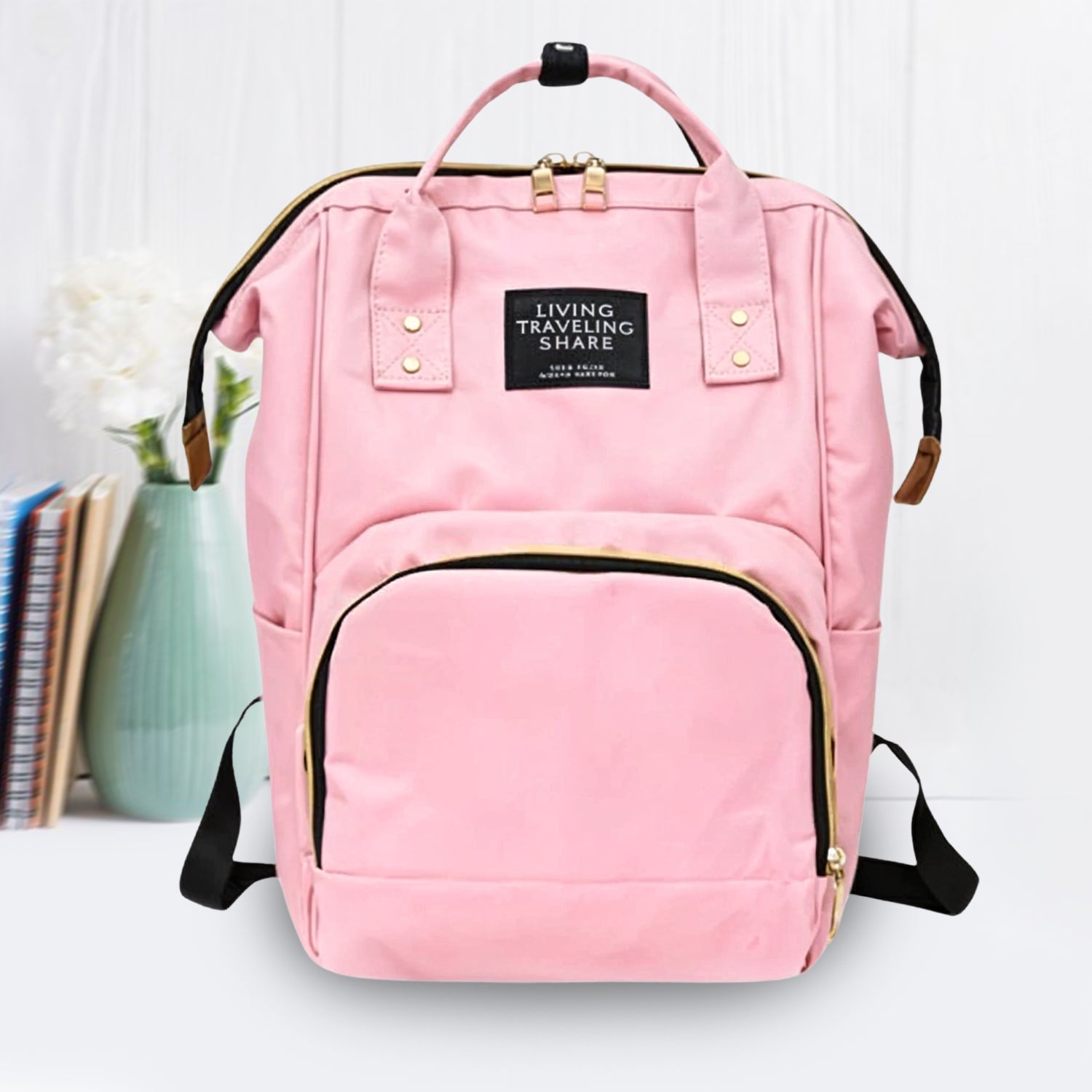 Side view of the spacious Tots Basics Diaper Bag Backpack.