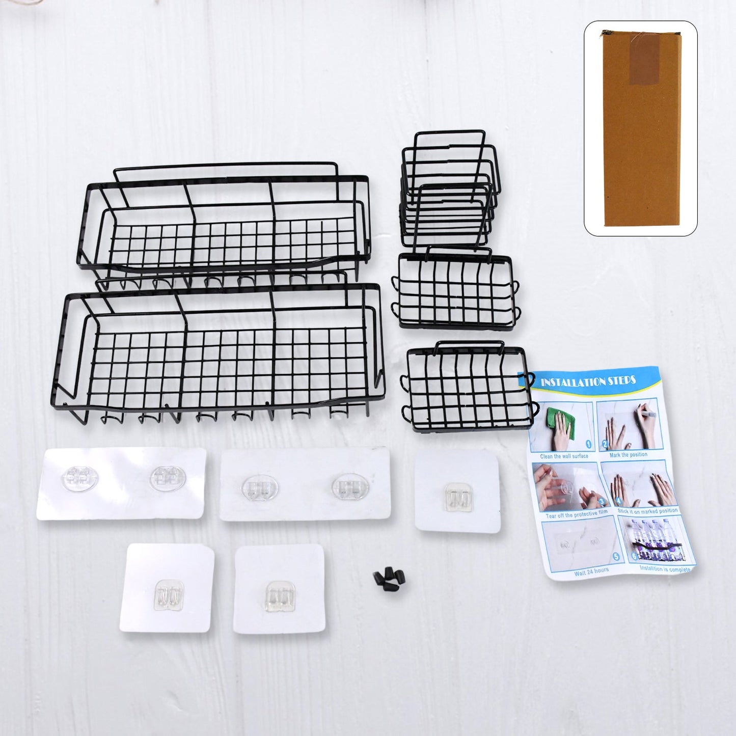 Metal shower caddy set displaying adhesive shelves for bathroom organization