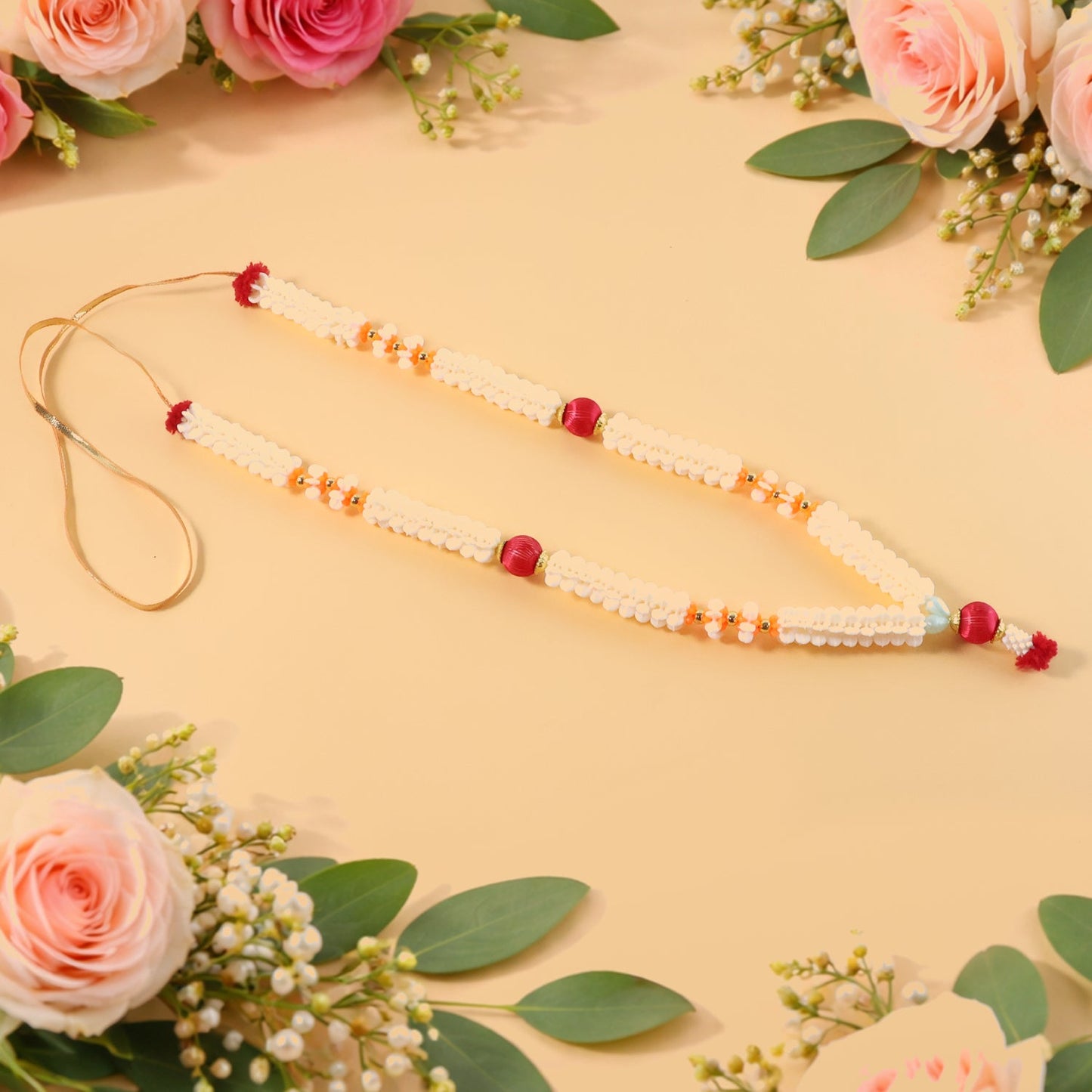 Traditional pooja gajra garland with floral beads for religious decoration