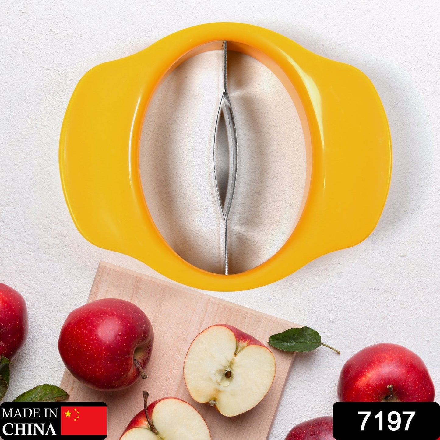 Top-down view of the stainless steel mango cutter, ready for slicing.