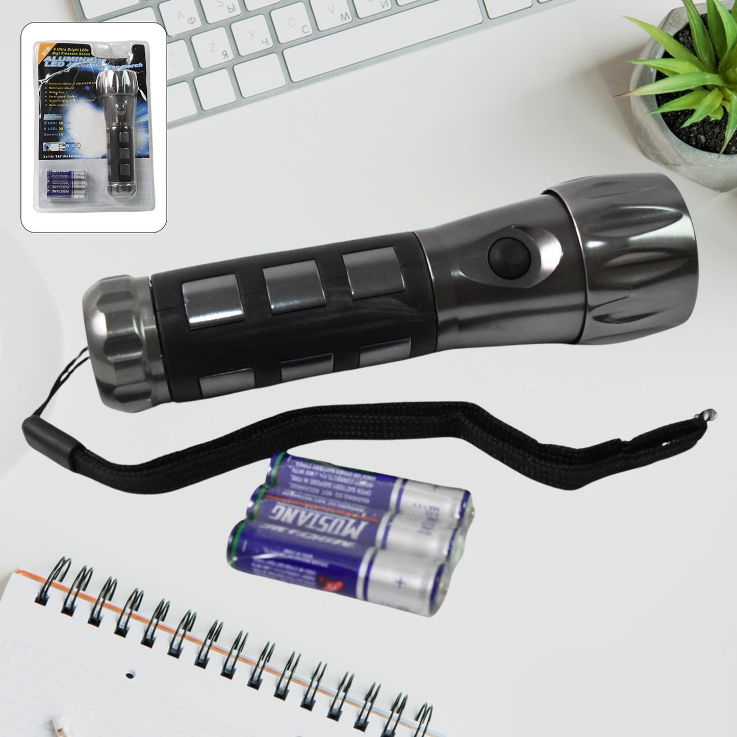 Aluminium LED Hand Torch with rubber grip, ready for use.
