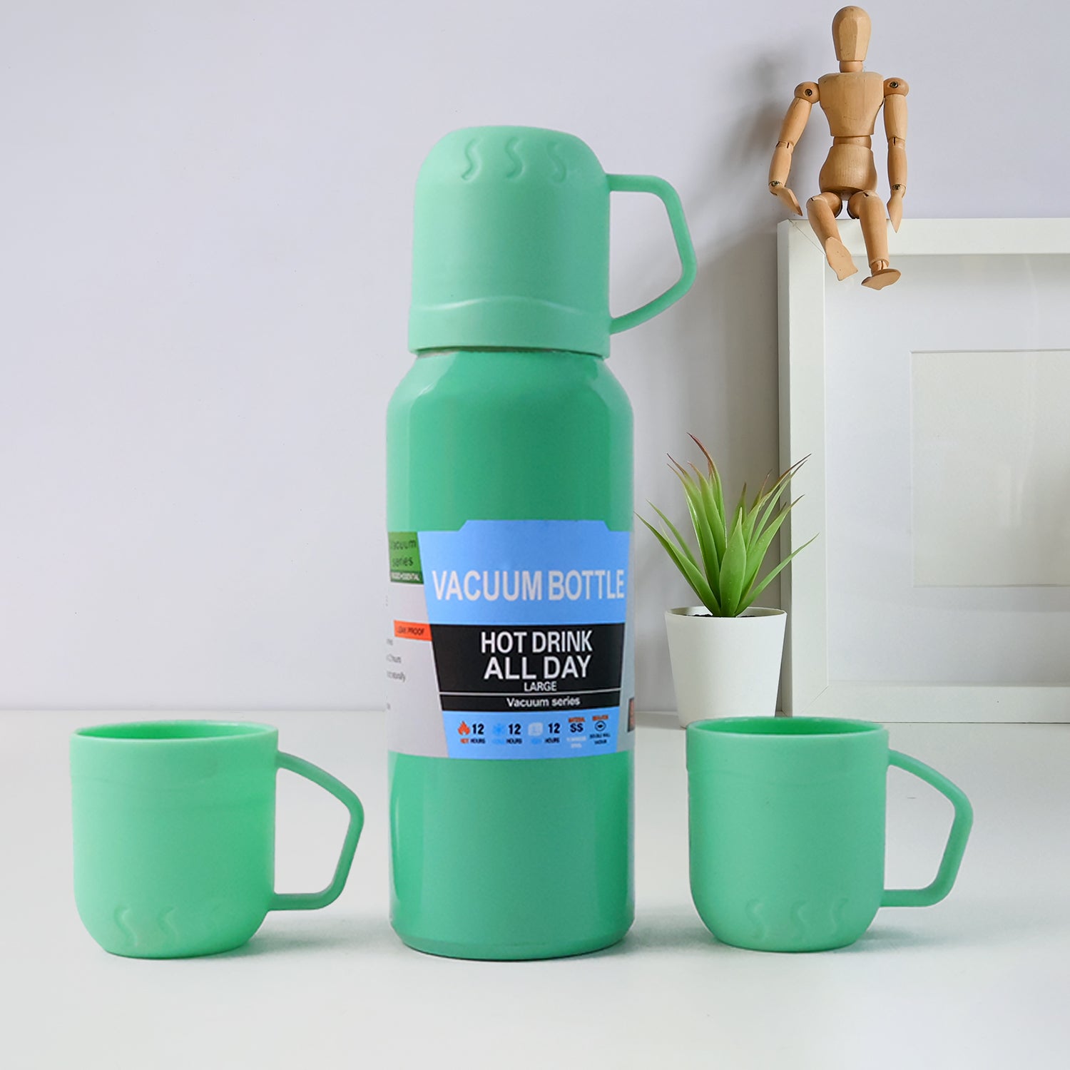 Green stainless steel vacuum flask set with 3 insulated cups for travel and daily use