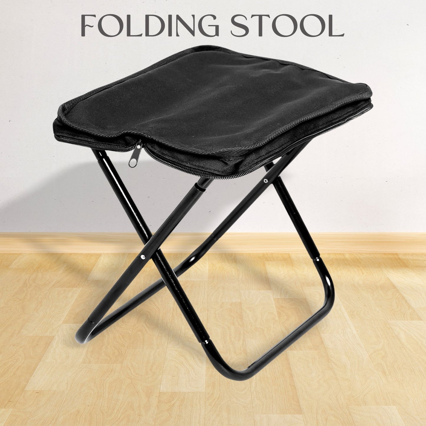 Folding Camping Stool set up in a lush green outdoor setting, ready for use.
