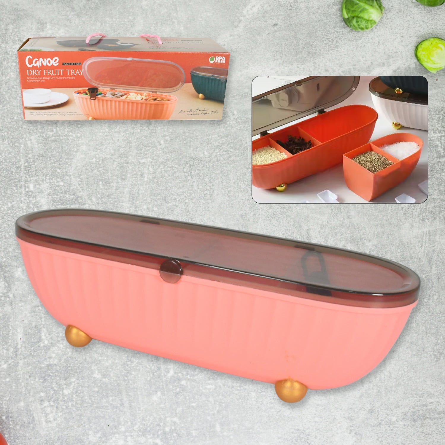 Clear 4-compartment spice box with spoons and lid for kitchen use.