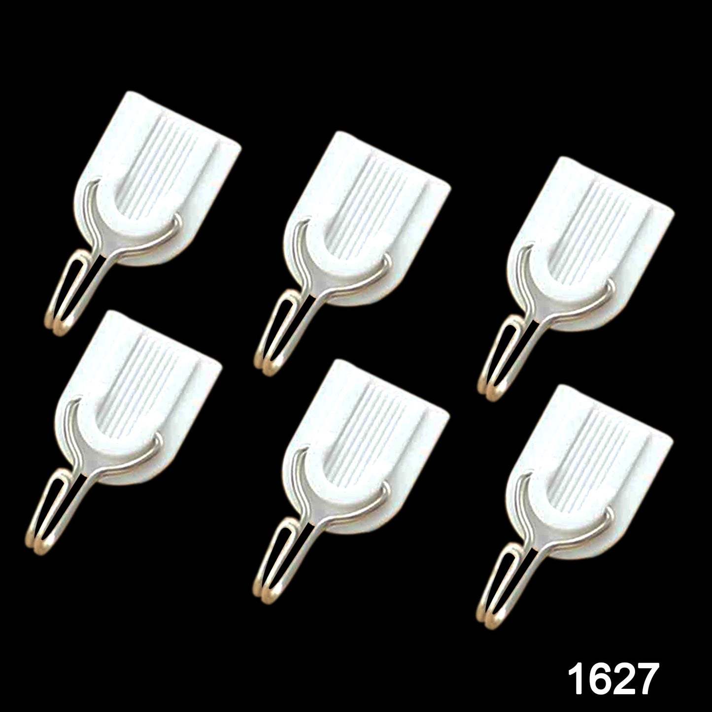 Close-up of a white plastic self-adhesive hook on a wall.