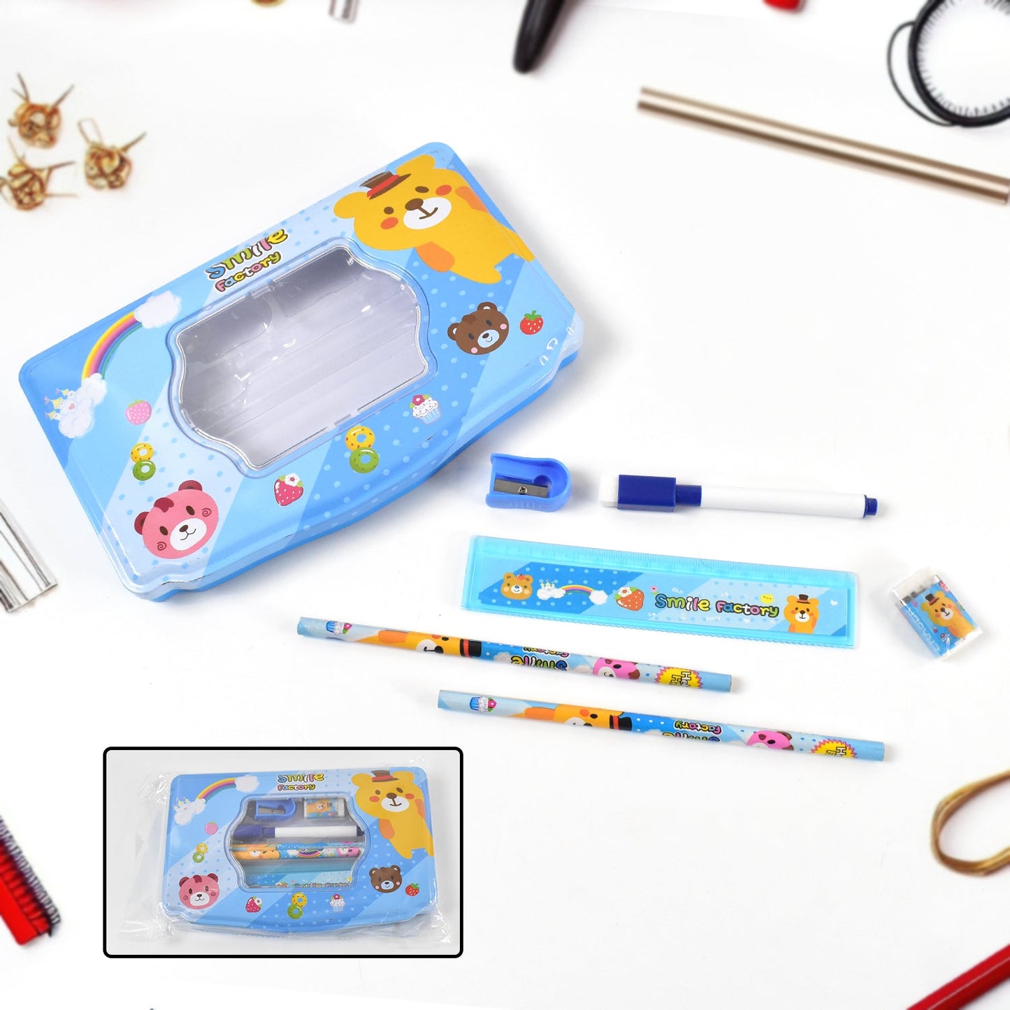 Close-up of the durable metal compass box featuring a playful cartoon design for school children.