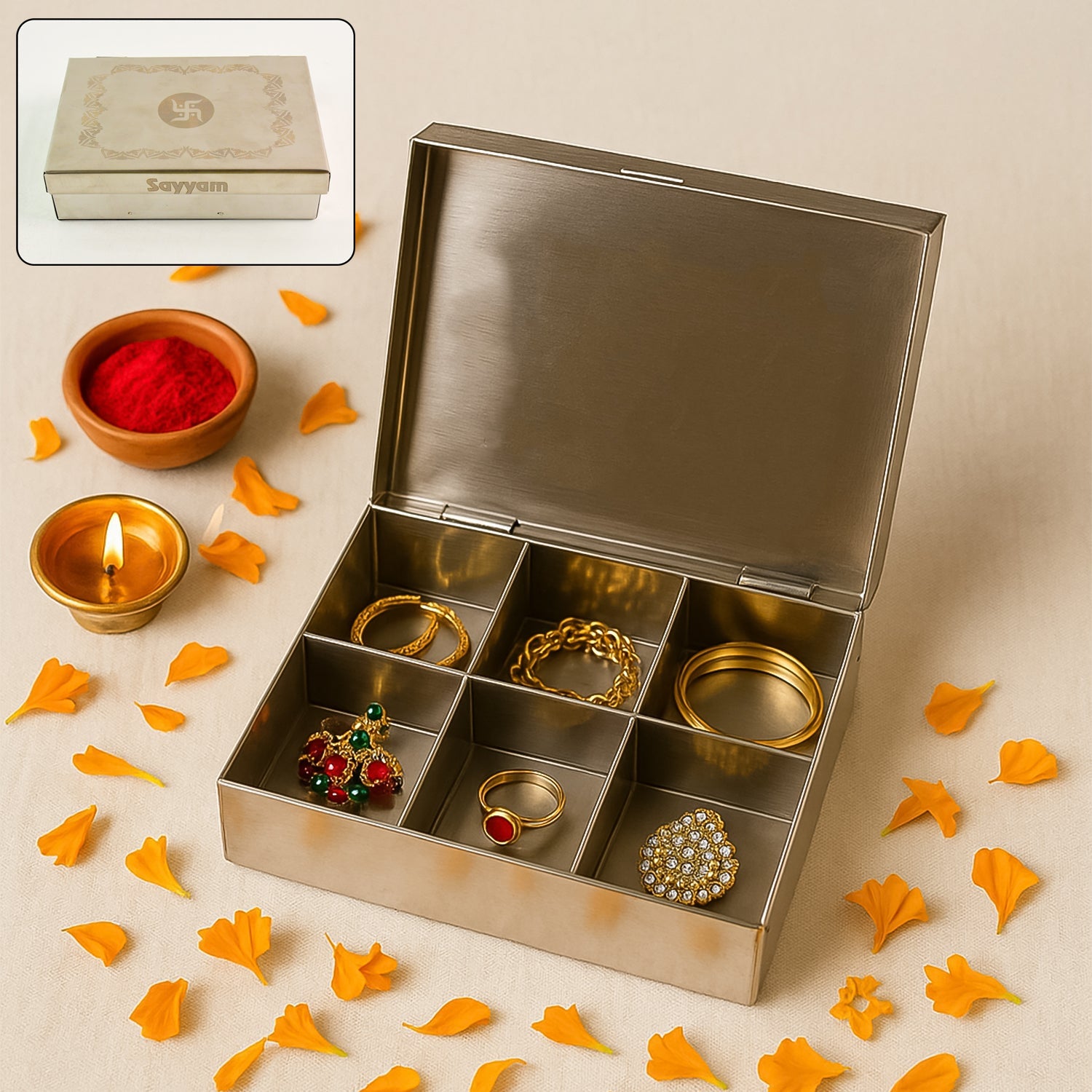 Front view of the closed stainless steel jewelry organizer with engraved lid.