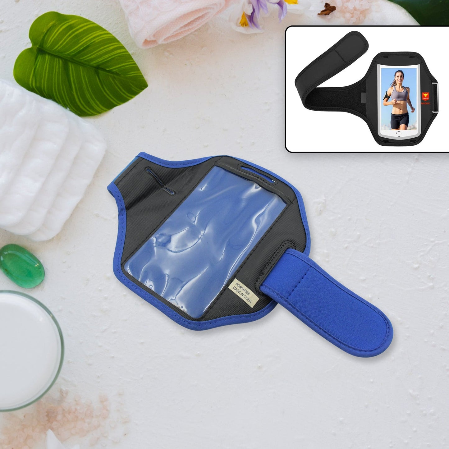 Black running armband on a white background, showcasing its phone holder functionality for active users.