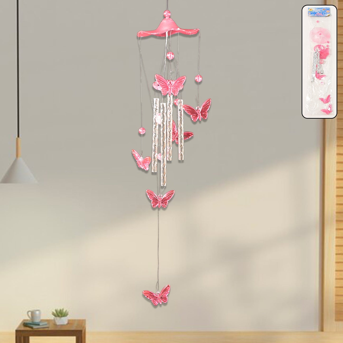 Butterfly Bell Wind Chime hanging outdoors with colourful butterfly design