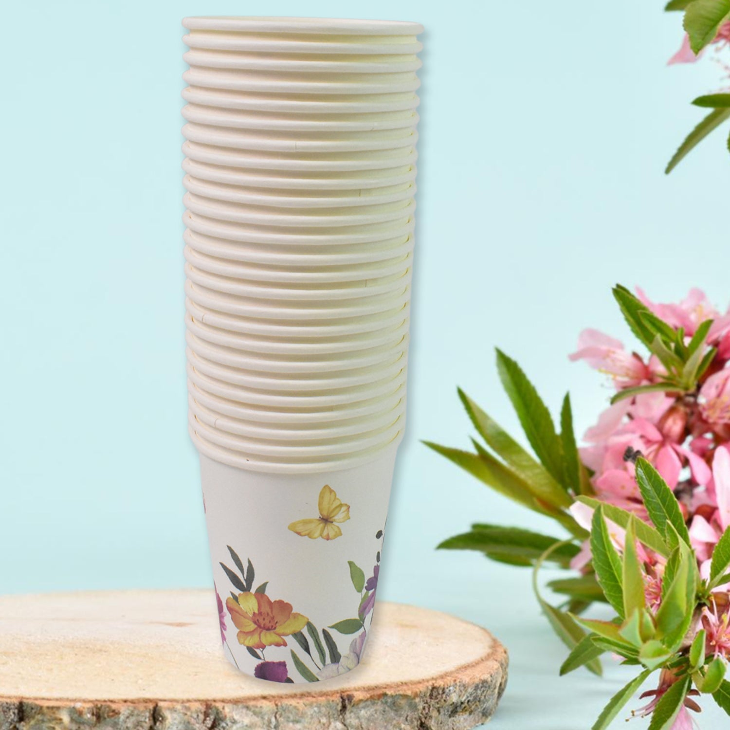 Group of disposable paper cups with a focus on their unique designs.