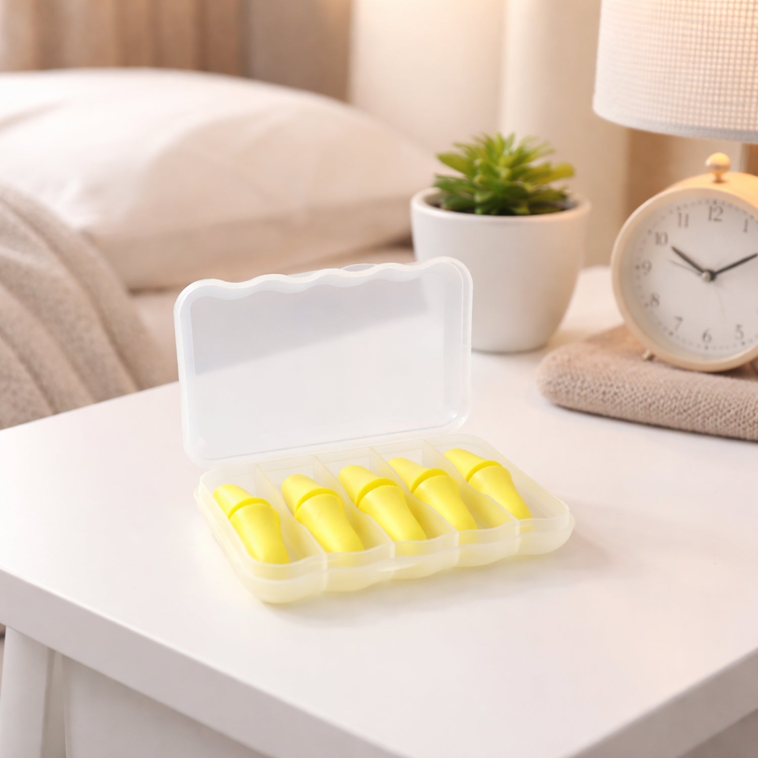 Soft reusable foam ear plugs with compact storage case laid out