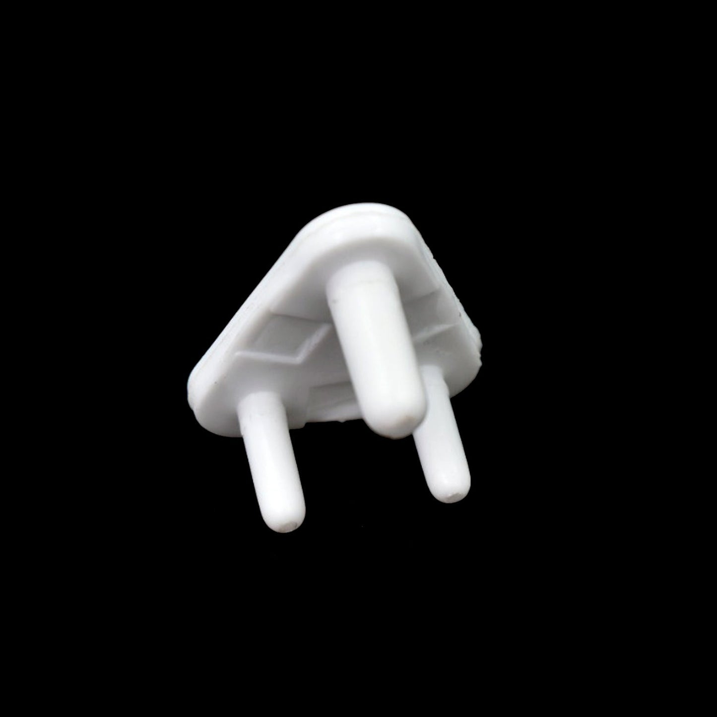 White baby socket covers, a pack of 100 electrical plug protectors for child safety.