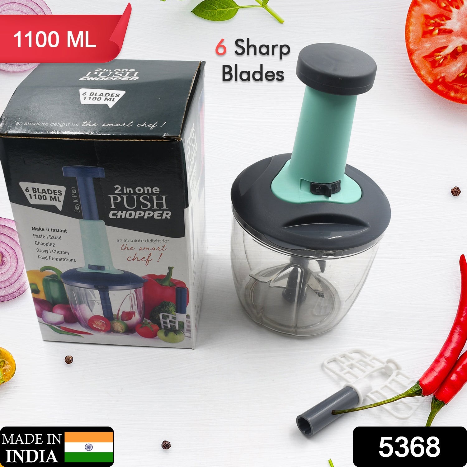 User demonstrating the easy push-up action of the manual vegetable chopper.