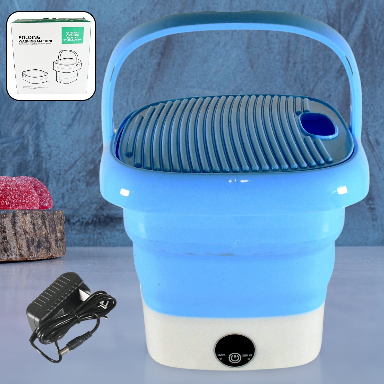Portable washing machine in use, cleaning delicate baby clothes efficiently.