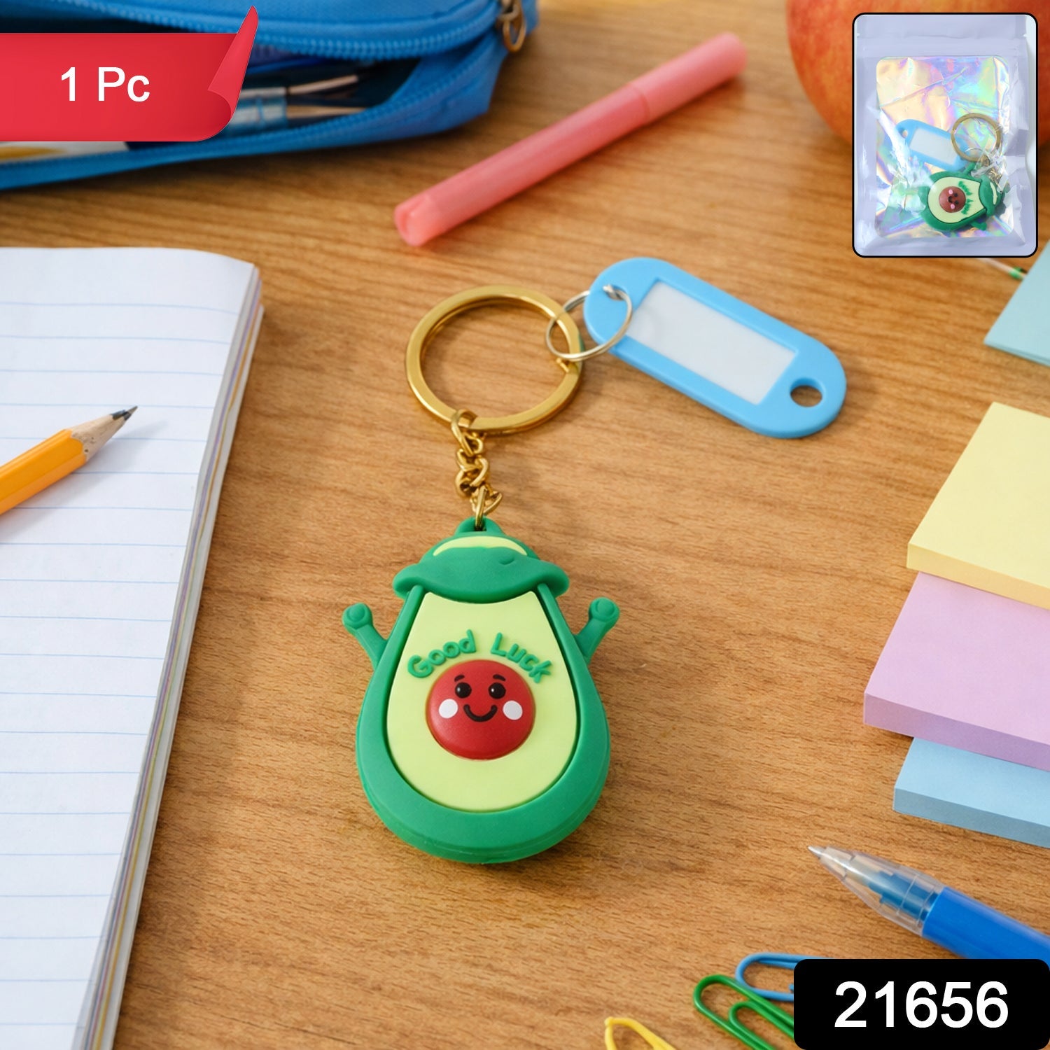 Metal ring on avocado cartoon character keychain for secure attachment