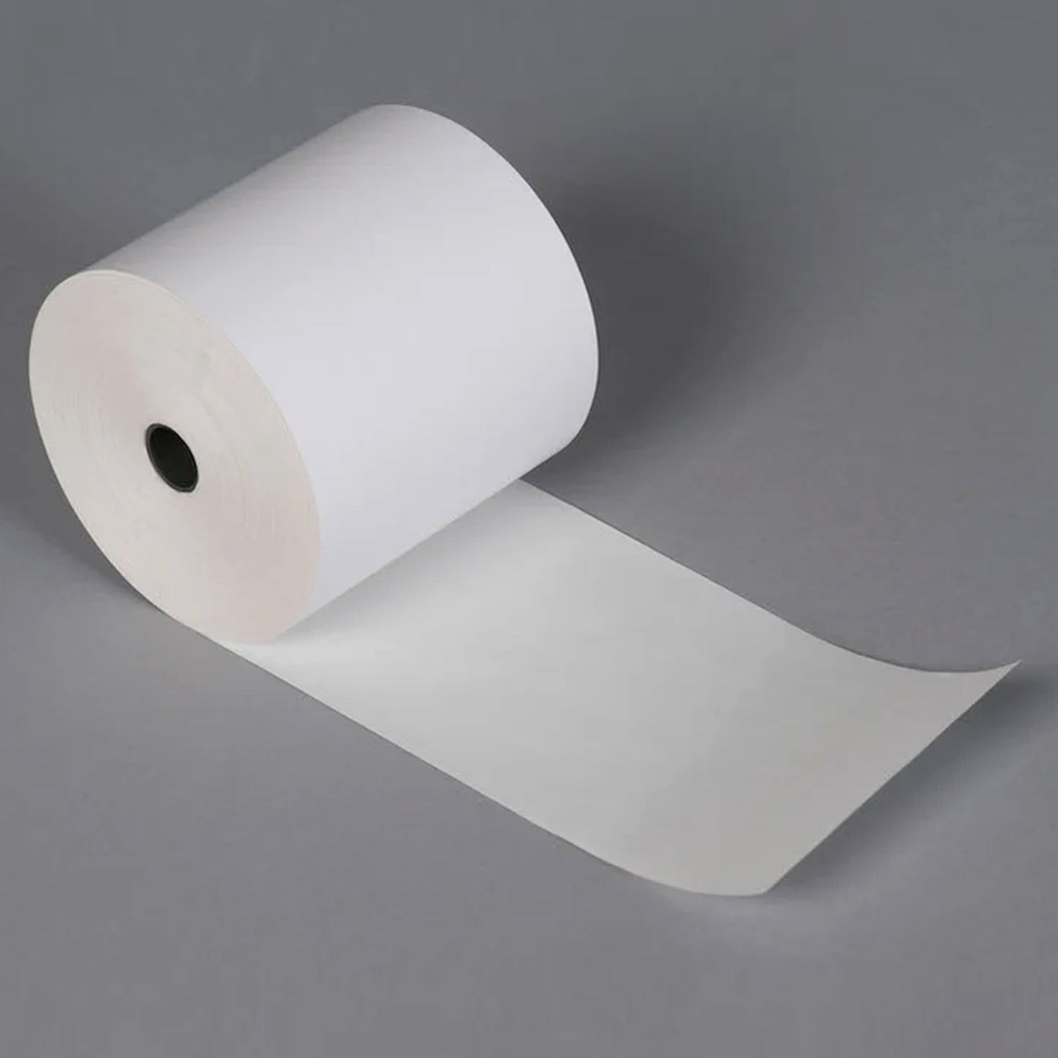 Thermal label roll for barcode printing showing crisp print and self-adhesive backing