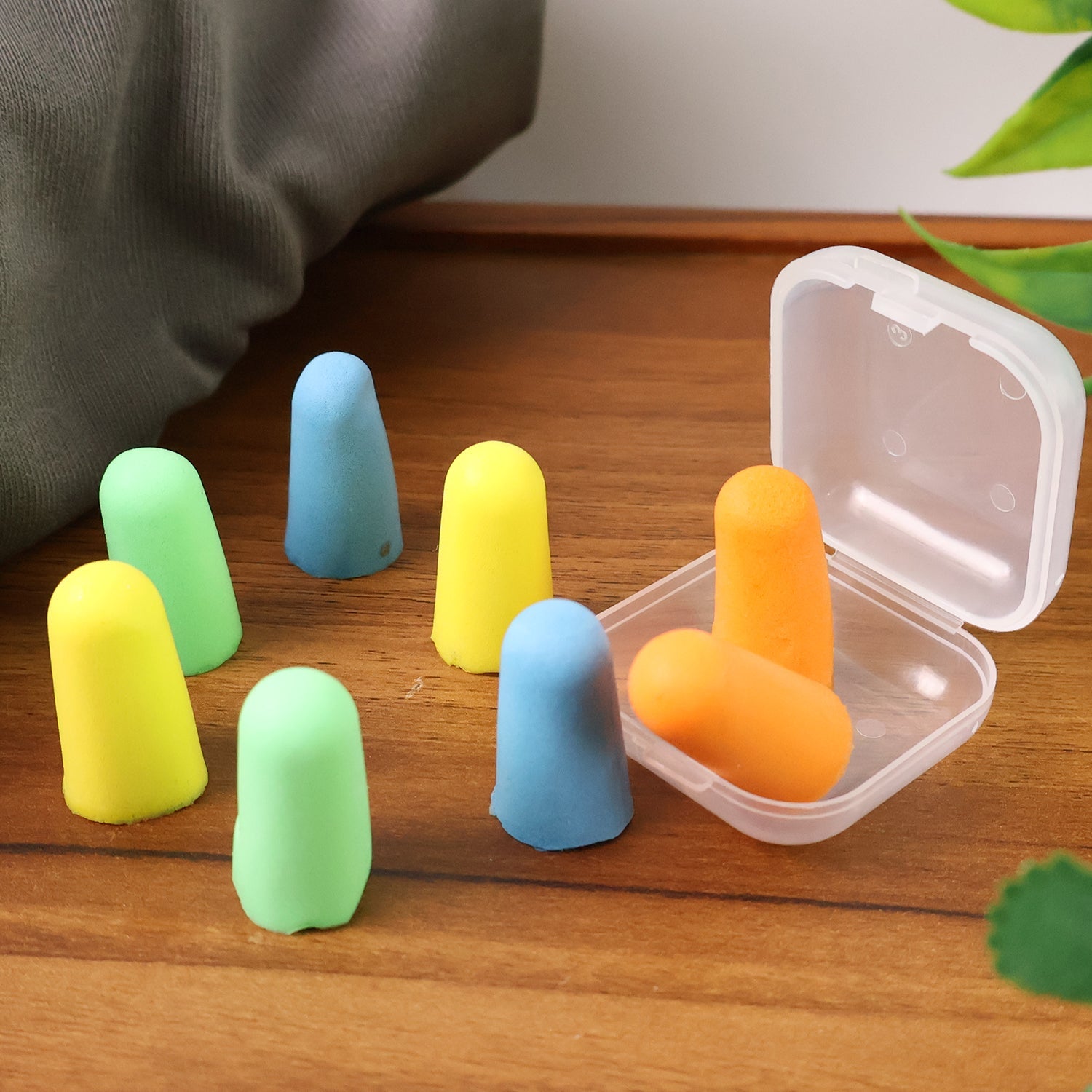 Set of 4 pairs of soft foam earplugs in multiple colors for noise reduction
