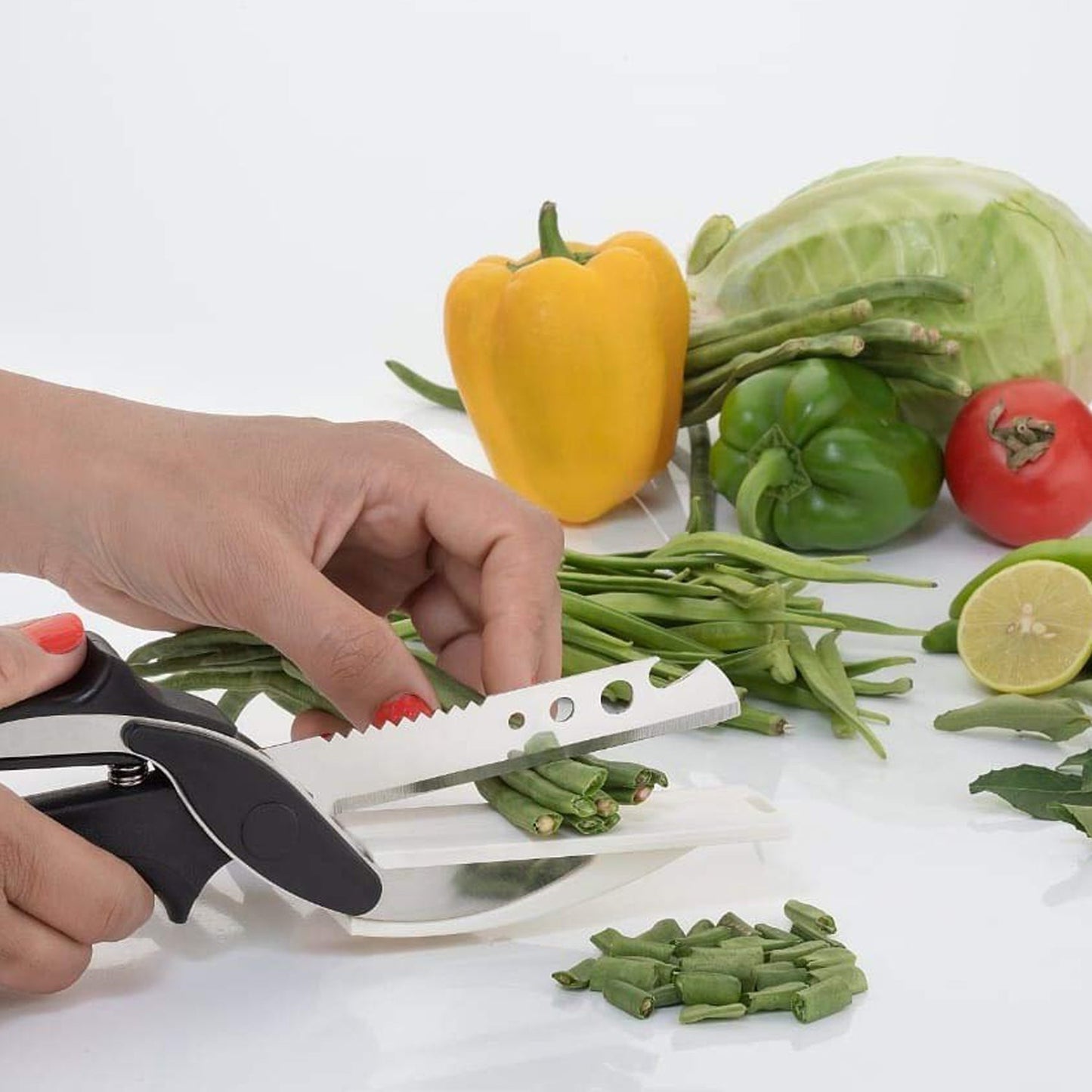Close-up of the clever cutter's stainless steel blade and built-in cutting board.